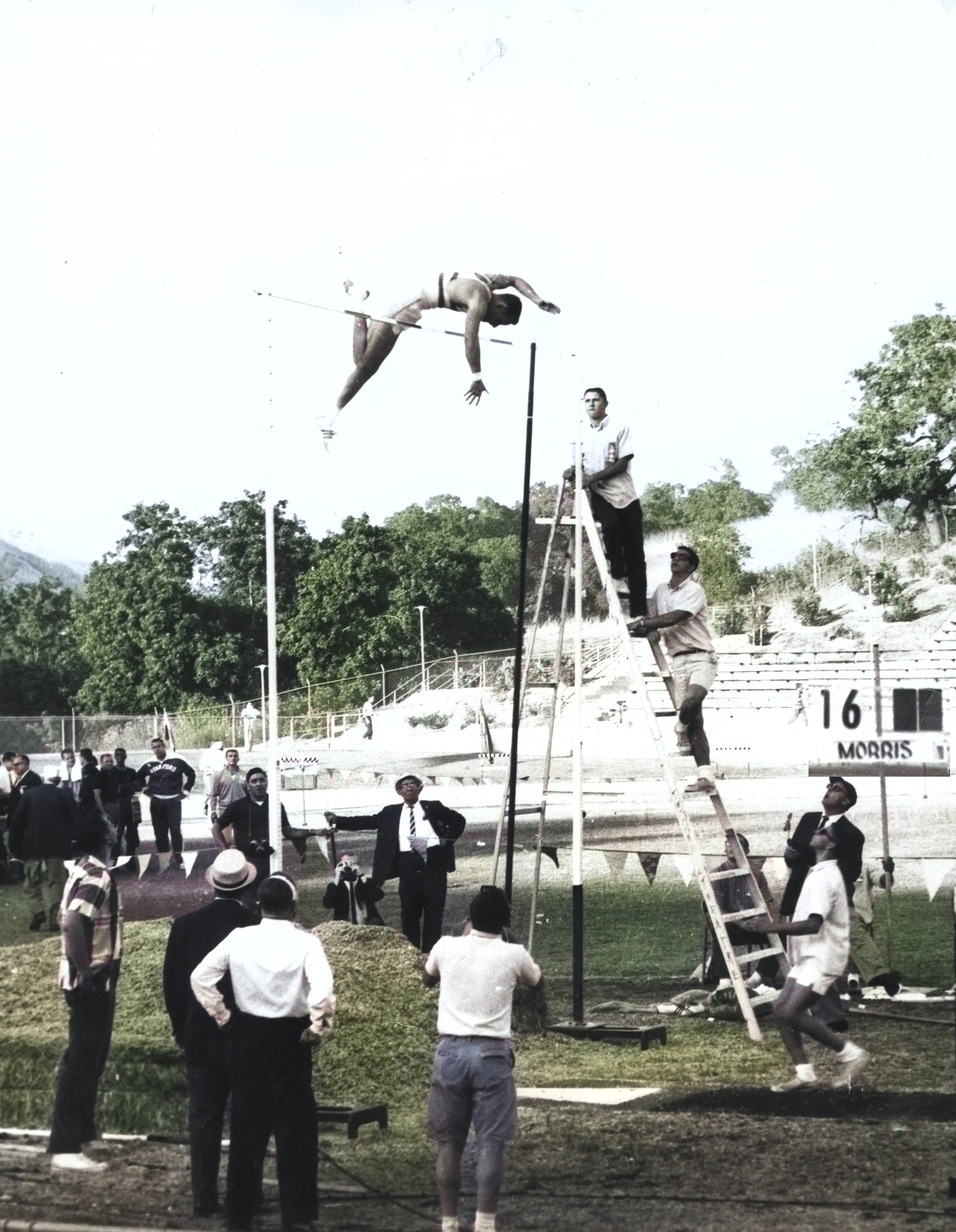 Thanks to a little Photoshop magic, Ron Morris’ 15' 8" vault becomes the 16' 1/4" personal best he jumped later that day at the 1962 AAU National Championships held at Mount San Antonio College. (This was the first full season for the fiberglass pole, but no foam pit yet!)